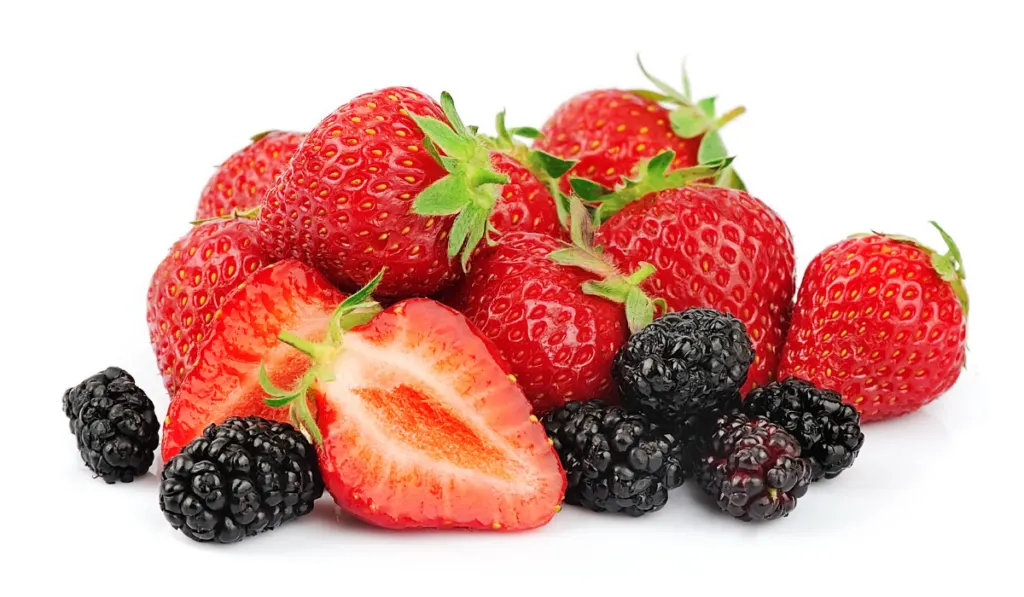 big heap of berries of strawberry and mulberry on white background