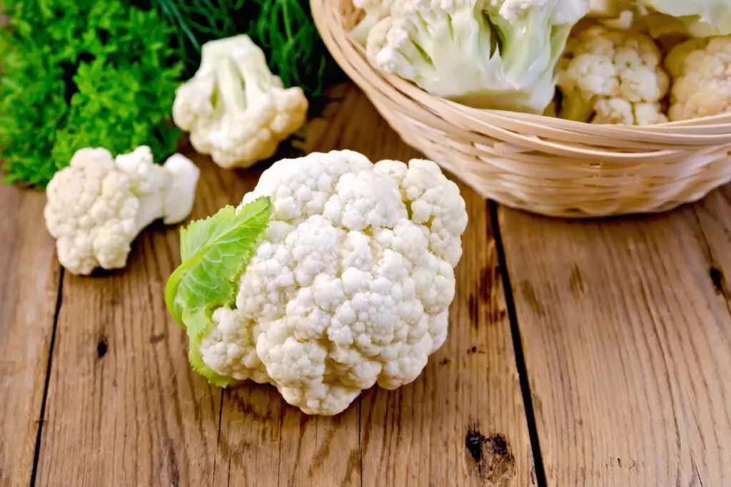 cauliflower with a basket on the board