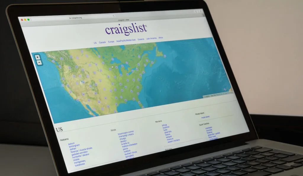 Laptop displaying Craigslist website 