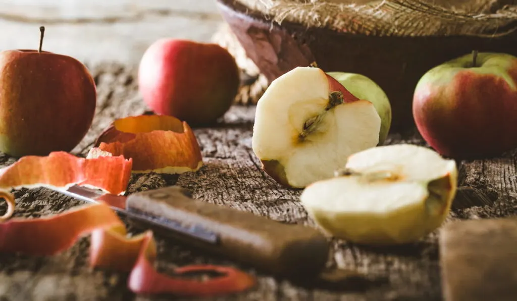 Peeled apple on table